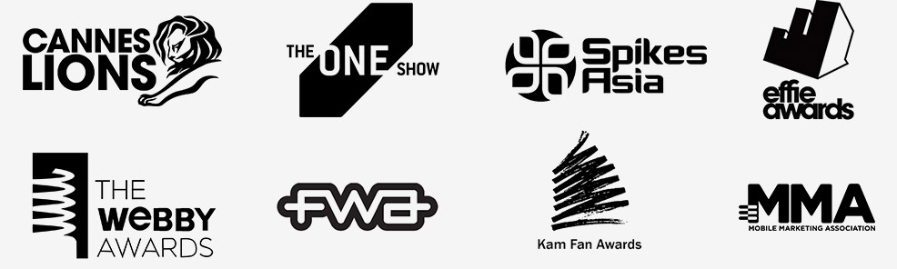 Logos of the award shows in question: Cannes Lions, The One Show, Spikes Asia, Effie Awards, The Webby Awards, FWA, Kam Fan Awards, MMA
